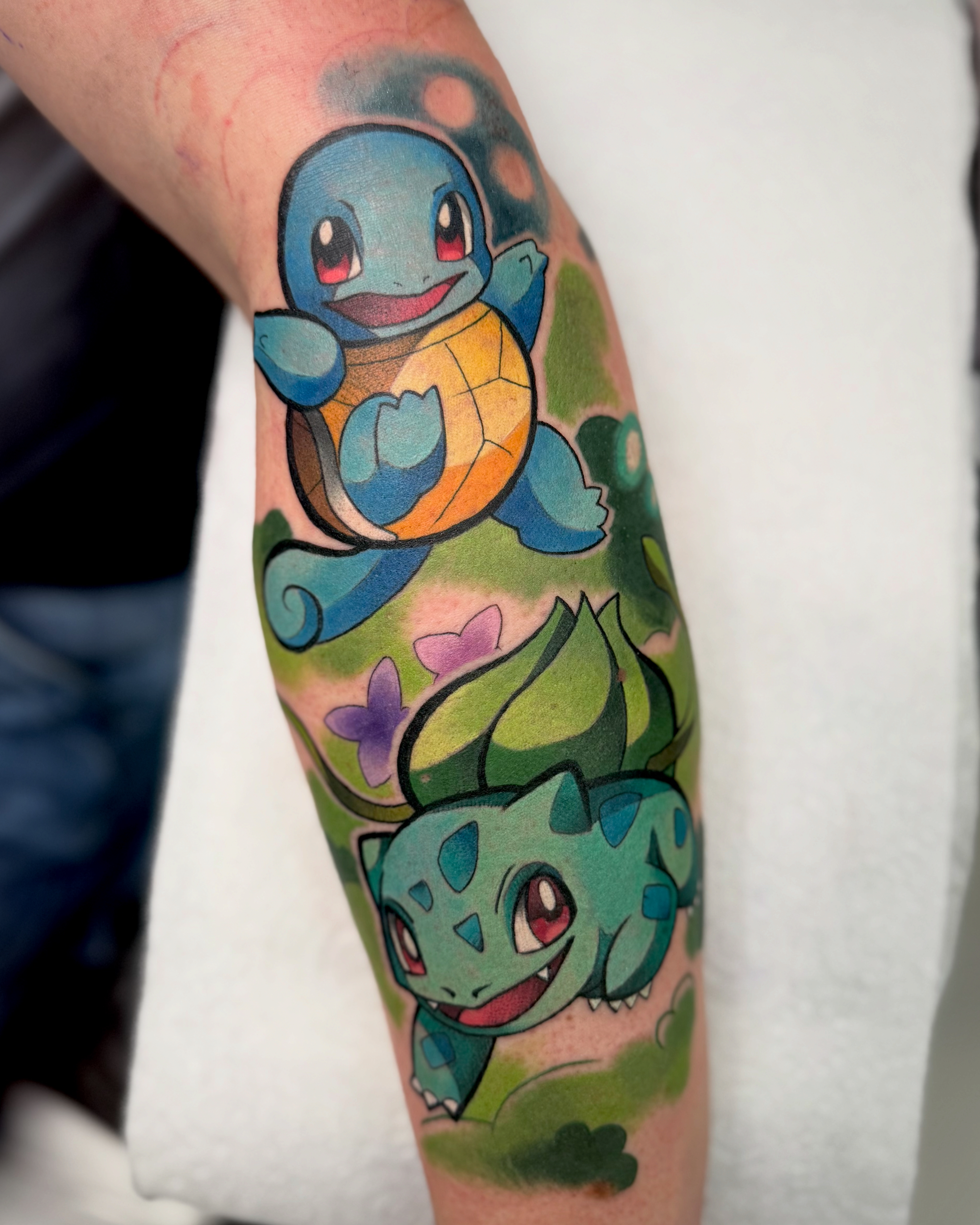 Pokemon colour tattoo with squirtle and bulbasaur